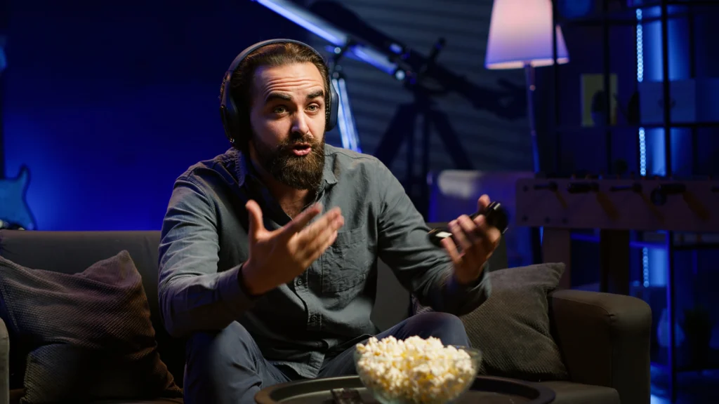 man-disbelief-after-losing-while-playing-videogames-receiving-game